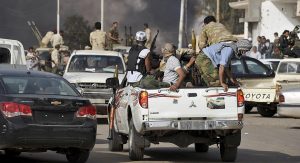 Fighters prepare for clashes between rival militias in Sabha, Libya, March 29, 2012. (photo by REUTERS/Stringer)